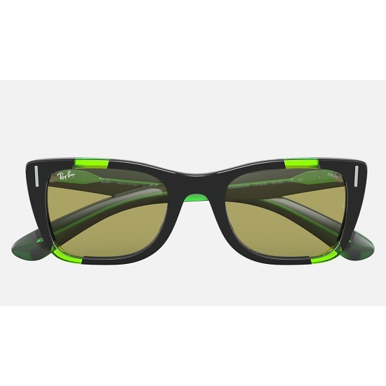 CARIBBEAN GREEN FLUO
Lenses: Green Photochromic Classic  +  Frame: Black and Green Fluo