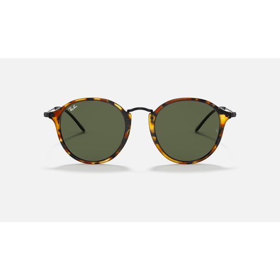ROUND FLECK
Lenses: Green Classic G-15  +  Frame: Spotted Black Havana