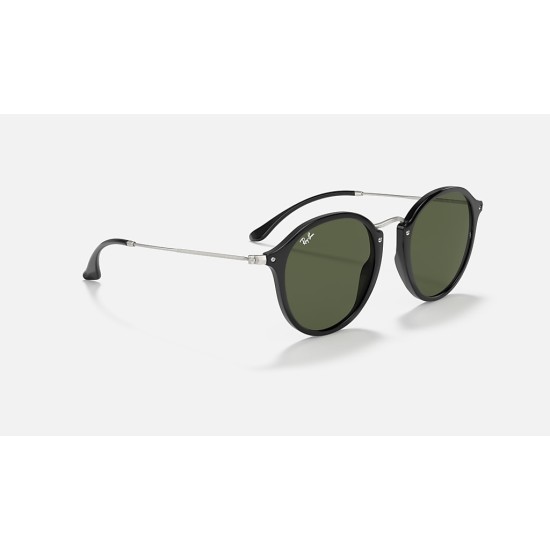 ROUND FLECK
Lenses: Green Classic G-15  +  Frame: Black