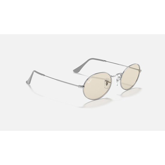 OVAL SOLID EVOLVE
Lenses: Light Brown Photochromic Classic  +  Frame: Silver