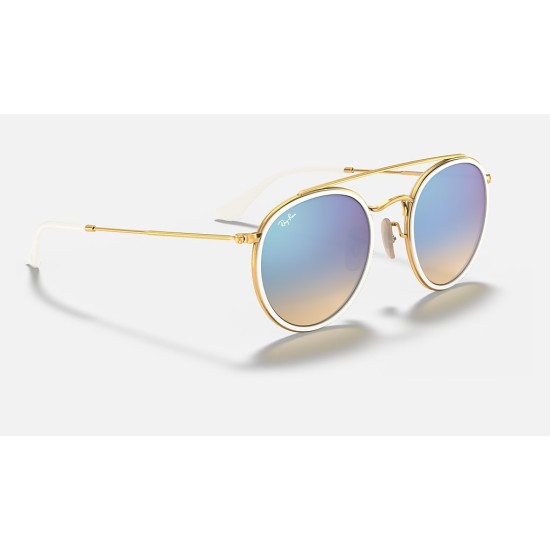 ROUND DOUBLE BRIDGE
Lenses: Blue Gradient - Mirror  +  Frame: Gold