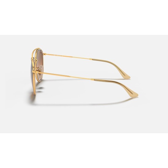 ROUND DOUBLE BRIDGE
Lenses: Brown Gradient  +  Frame: Gold