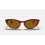 Nina
Lenses: Brown Classic  +  Frame: Tortoise