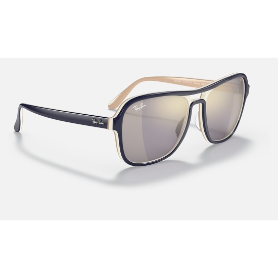 STATE SIDE MIRROR EVOLVE
Lenses: Dark Grey/Gold Photochromic Mirror  +  Frame: Blue